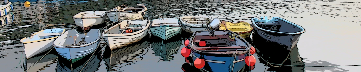 Mevagissey mevagissey harbour in devon with several colourful small boats on the water